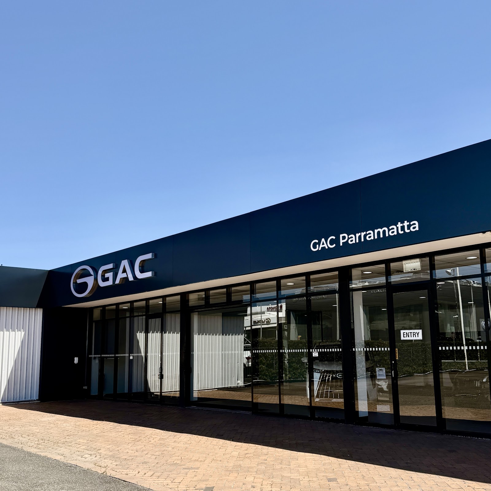 The Aion Parramatta GAC showroom at 41 Church Street, its black fascia carrying the GAC mark and the words GAC Parramatta above the entry doors.